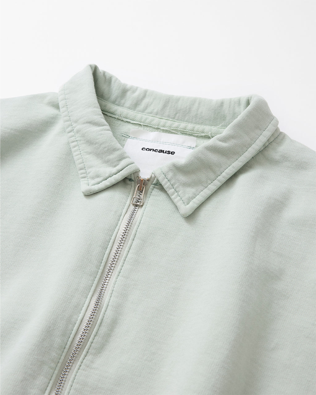 concause FRONT HALF ZIP SWEAT SHIRTS / OFF WHITE 裾のダメージ加工とステッチディテール
