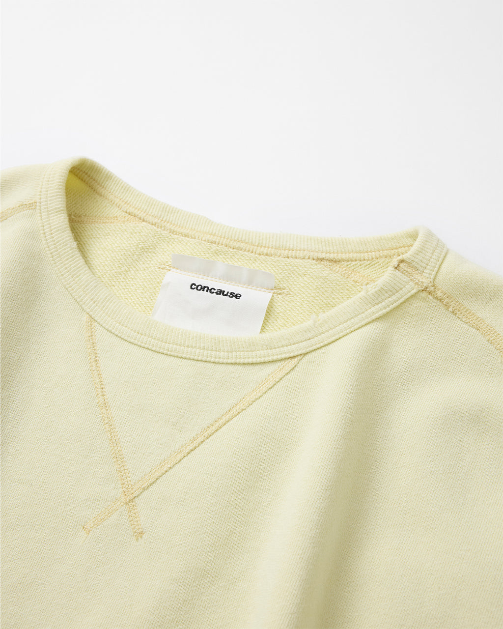 concause CREW NECK SWEAT SHIRTS / OFF WHITE 裾とリブのステッチディテール
