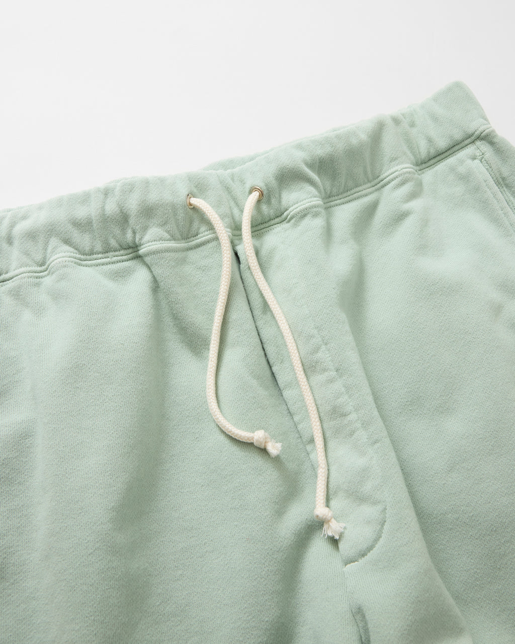 concause SWEAT PANTS / GREEN ウエストのドローコードとリブディテール
